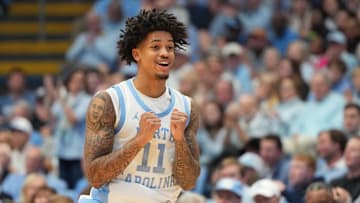 Dec 7, 2025; Chapel Hill, North Carolina, USA;  North Carolina Tar Heels forward Jonathan Powell (11) reacts after hitting a three point shot in the second half at Dean E. Smith Center. Mandatory Credit: Bob Donnan-Imagn Images