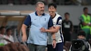 Son Heung-min (right) will remain at Tottenham until 2026