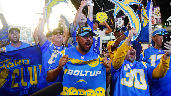  Fans react after Boston College guard Zion Johnson was selected as the sixteenth overall pick to the Los Angeles Chargers during the first round of the 2022 NFL Draft at the NFL Draft Theater. 