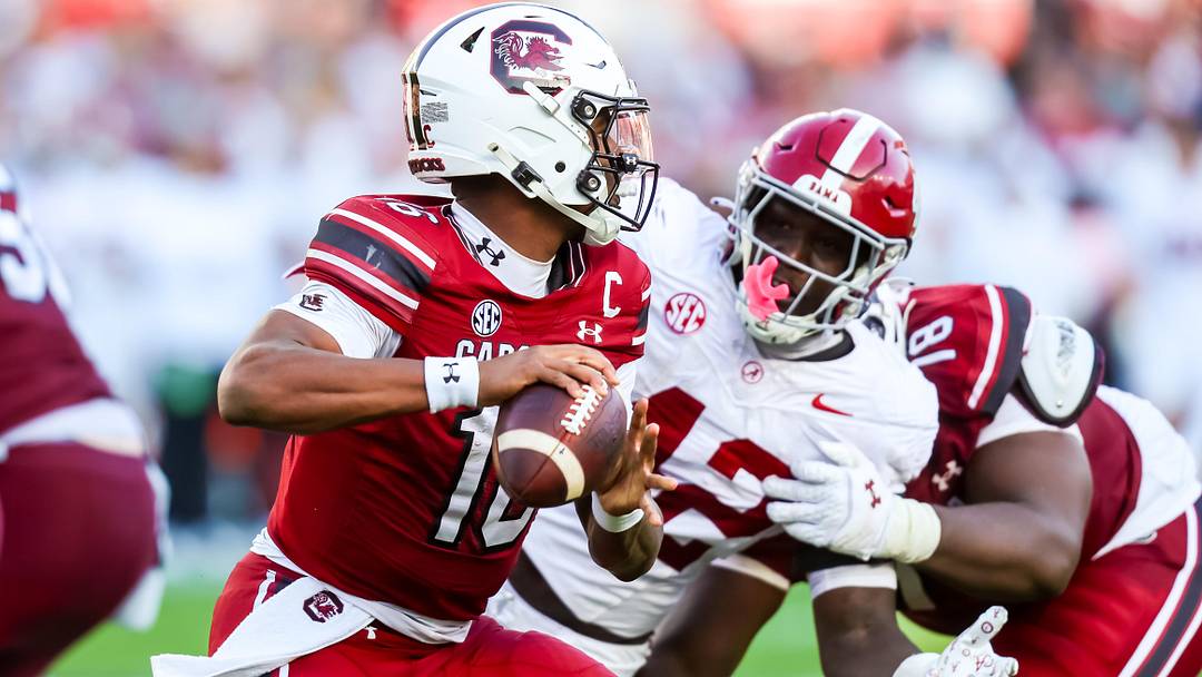 Oct 25, 2025; Columbia, South Carolina, USA; South Carolina Gamecocks quarterback Lanorris Sellers (16) looks to pass under pressure from Alabama Crimson Tide linebacker Yhonzae Pierre (42) in the second quarter at Williams-Brice Stadium. Oct 25, 2025; Columbia, South Carolina, USA; South Carolina Gamecocks quarterback Lanorris Sellers (16) looks to pass under pressure from Alabama Crimson Tide linebacker Yhonzae Pierre (42) in the second quarter at Williams-Brice Stadium.