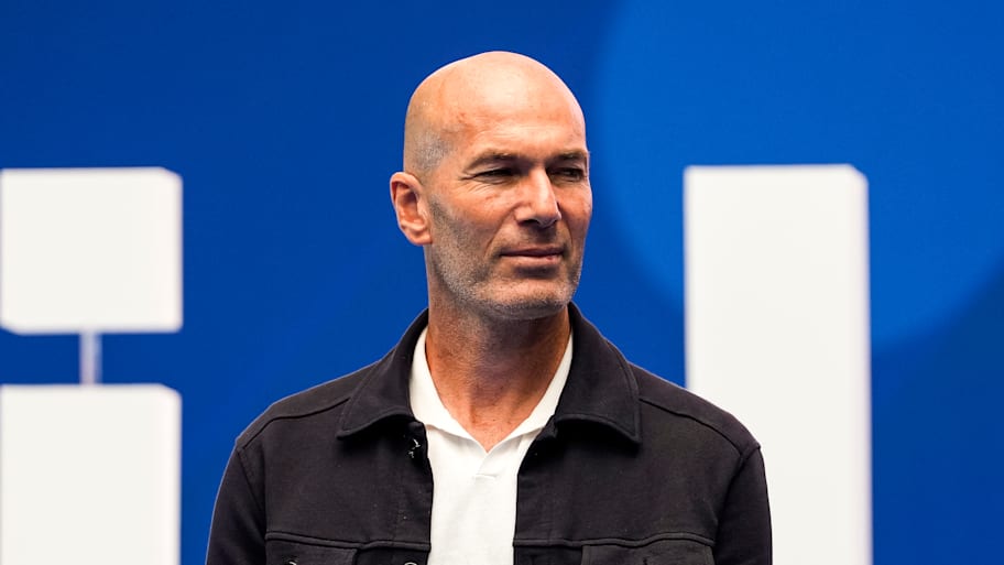 Zinedine Zidane casting his gaze into the distance.