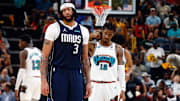 Apr 18, 2025; Memphis, Tennessee, USA; Dallas Mavericks forward Anthony Davis (3) and Memphis Grizzlies guard Ja Morant (12) look on during the third quarter at FedExForum. Mandatory Credit: Petre Thomas-Imagn Images