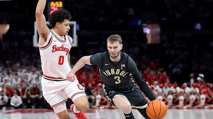 Mar 1, 2026; Columbus, Ohio, USA;  Purdue Boilermakers guard Braden Smith (3) drives to the basket as Ohio State Buckeyes guard John Mobley Jr. (0) defends during the first half at Value City Arena. Mandatory Credit: Joseph Maiorana-Imagn Images