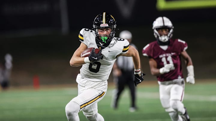 Oct 18, 2024; West Des Moines: Southeast Polk's Sam Zelenovich (6) catches a pass against Dowling Catholic at Valley Stadium.