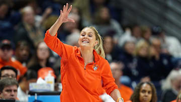 Mar 22, 2025; Storrs, Connecticut, USA; Oklahoma State Cowgirls head coach Jacie Hoyt watches from the sideline as they take on the South Dakota State Jackrabbits at Harry A. Gampel Pavilion. Mandatory Credit: David Butler II-Imagn Images
