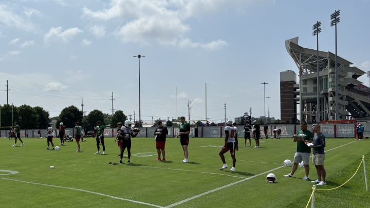 Louisville players practice during fall camp.