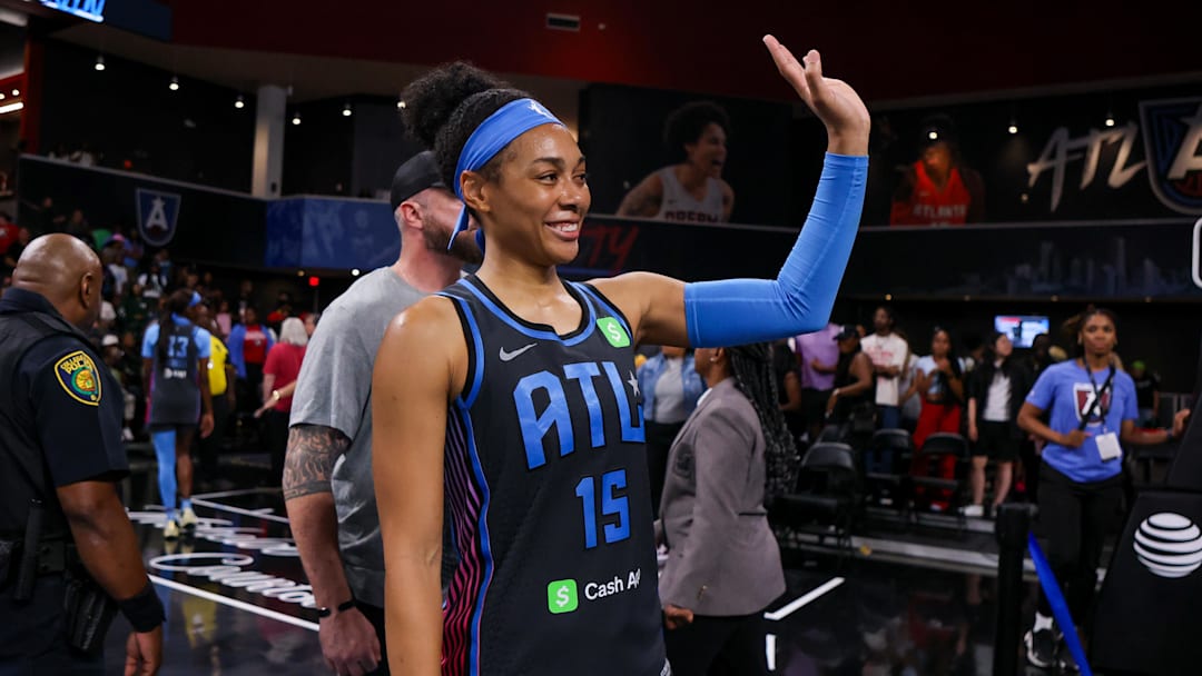 Aug 29, 2025; College Park, Georgia, USA; Atlanta Dream guard Allisha Gray (15) waves to the crowd after a victory over the Dallas Wings at Gateway Center Arena at College Park. Mandatory Credit: Brett Davis-Imagn Images
