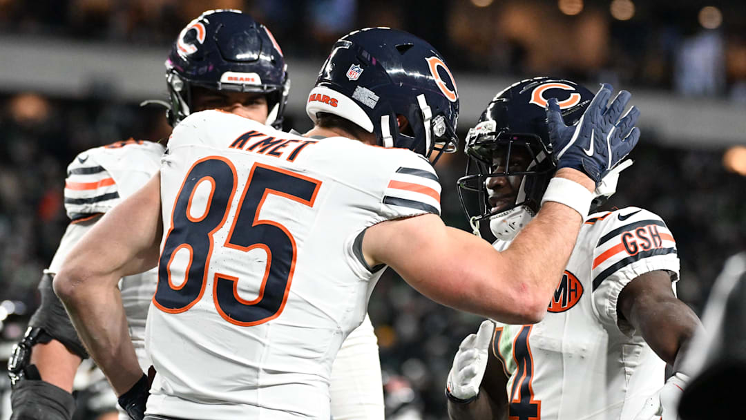 Nov 28, 2025; Philadelphia, Pennsylvania, USA; Chicago Bears tight end Cole Kmet (85) celebrates after scoring a touchdown against the Philadelphia Eagles with wide receiver Olamide Zaccheaus (14) during the fourth quarter of the game at Lincoln Financial Field. Mandatory Credit: Eric Hartline-Imagn Images