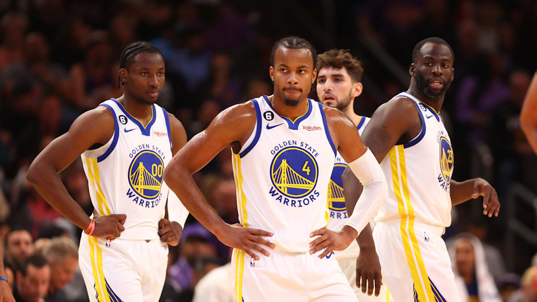 Oct 25, 2022; Phoenix, Arizona, USA; Golden State Warriors guard Moses Moody (4), forward Jonathan Kuminga (00) and forward Draymond Green (23) against the Phoenix Suns at Footprint Center. Mandatory Credit: Mark J. Rebilas-Imagn Images Oct 25, 2022; Phoenix, Arizona, USA; Golden State Warriors guard Moses Moody (4), forward Jonathan Kuminga (00) and forward Draymond Green (23) against the Phoenix Suns at Footprint Center. Mandatory Credit: Mark J. Rebilas-Imagn Images