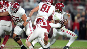 Oklahoma Sooners defensive lineman Bergin Kysar (80) brings down Alabama Crimson Tide quarterback Jalen Milroe (4) during a college football game between the University of Oklahoma Sooners (OU) and the Alabama Crimson Tide at Gaylord Family - Oklahoma Memorial Stadium in Norman, Okla., Saturday, Nov. 23, 2024.