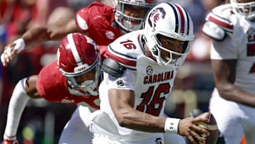 Oct 12, 2024; Tuscaloosa, Alabama, USA;  South Carolina Gamecocks quarterback LaNorris Sellers (16) escapes pressure from the Alabama Crimson Tide as he scrambles during the first half at Bryant-Denny Stadium. Mandatory Credit: Butch Dill-Imagn Images