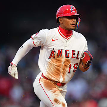 Apr 18, 2025; Anaheim, California, USA; Los Angeles Angels second baseman Kyren Paris (19) runs to third against the San Francisco Giants during the second inning at Angel Stadium. Mandatory Credit: Gary A. Vasquez-Imagn Images