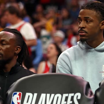 Memphis Grizzlies guard Ja Morant watches from the bench on April 26, 2025.