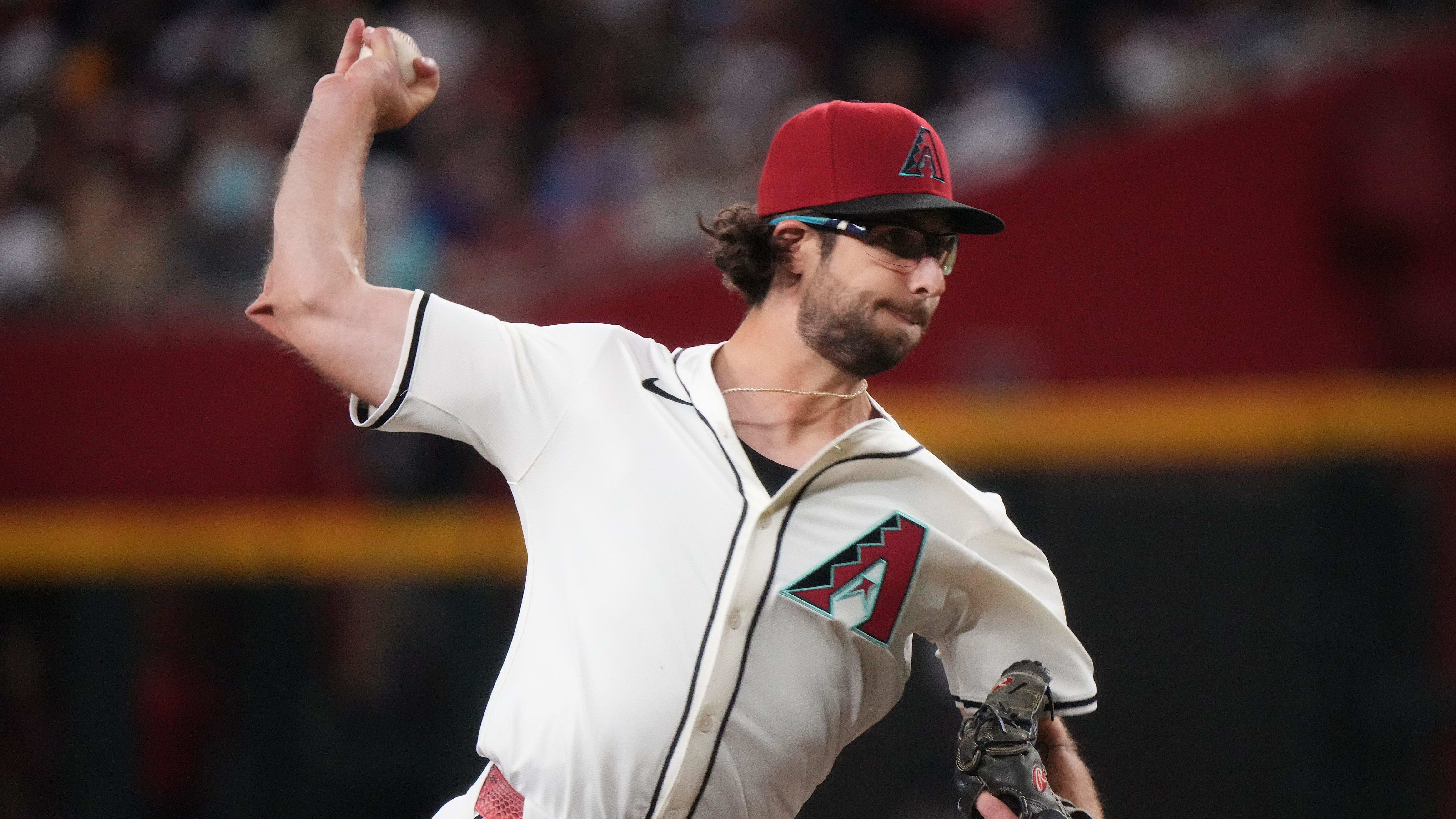 Arizona Diamondbacks Zac Gallen (23) pitches against the Colorado Rockies on Opening Day at Chase Field