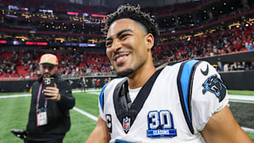 Jan 5, 2025; Atlanta, Georgia, USA; Carolina Panthers quarterback Bryce Young (9) celebrates after a victory over the Atlanta Falcons in overtime at Mercedes-Benz Stadium. Mandatory Credit: Brett Davis-Imagn Images