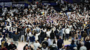 Penn State students and fans storm the court after the Penn State Nittany Lions upset the Purdue Boilermakers at Bryce Jordan Center. 
