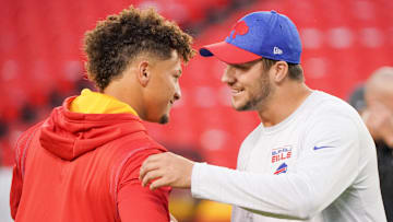 Oct 10, 2021; Kansas City, Missouri, USA; Kansas City Chiefs quarterback Patrick Mahomes (15) talks with Buffalo Bills quarterback Josh Allen (17) before warm ups at GEHA Field at Arrowhead Stadium. Mandatory Credit: Denny Medley-Imagn Images