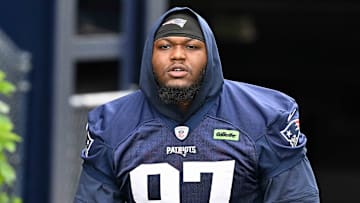 Jun 9, 2025; Foxborough, MA, USA; New England Patriots defensive end Milton Williams (97) walks to the practice fields at Gillette Stadium. Mandatory Credit: Eric Canha-Imagn Images