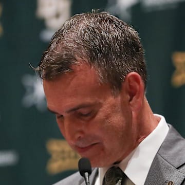 Dallas, TX, USA; Baylor Bears new athletic director Mack Rhoades reacts at a press conference during the Big 12 Media Days at Omni Dallas Hotel.