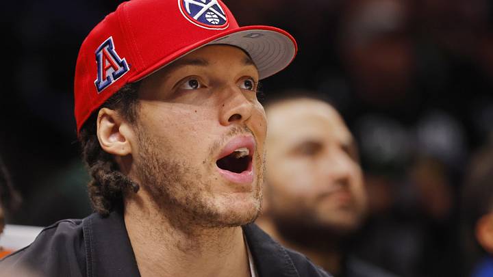 Apr 23, 2026; Minneapolis, Minnesota, USA; Denver Nuggets forward Aaron Gordon (32) watches from the bench as his team plays the Minnesota Timberwolves in the third quarter at Target Center. Mandatory Credit: Bruce Kluckhohn-Imagn Images