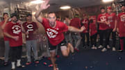 Sep 28, 2025; Milwaukee, Wisconsin, USA; Cincinnati Reds pitcher Brent Suter (31) shows his dancing skills after the Reds clinched a playoff spot after the game against the Milwaukee Brewers at American Family Field. Mandatory Credit: Benny Sieu-Imagn Images