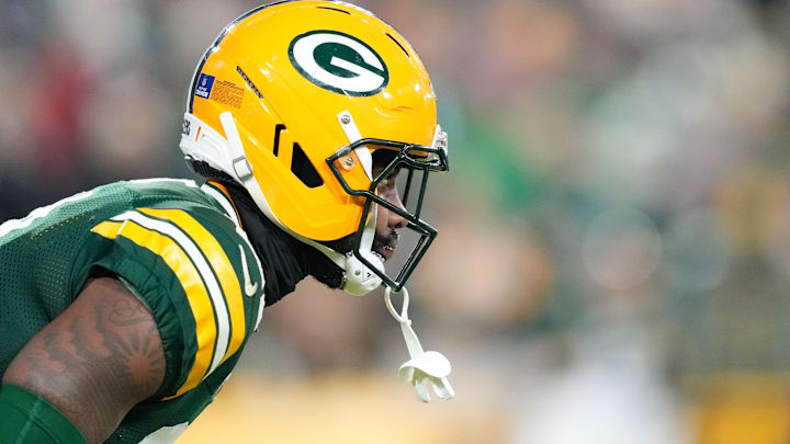 Dec 27, 2025; Green Bay, Wisconsin, USA; Green Bay Packers cornerback Nate Hobbs (21) waits for the kickoff return during the second quarter against the Baltimore Ravens at Lambeau Field.