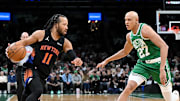 Dec 2, 2025; Boston, Massachusetts, USA; New York Knicks guard Jalen Brunson (11) drives to the basket against Boston Celtics guard Jordan Walsh (27) during the first half at the TD Garden. Mandatory Credit: Brian Fluharty-Imagn Images