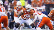 Dec 21, 2024; Austin, Texas, USA; Texas Longhorns offensive lineman DJ Campbell (52) against the Clemson Tigers during the CFP National playoff first round at Darrell K Royal-Texas Memorial Stadium. Mandatory Credit: Mark J. Rebilas-Imagn Images