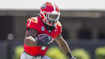 Apr 13, 2024; Athens, GA, USA; Georgia Bulldogs running back Trevor Etienne (1) runs with the ball during the G-Day Game at Sanford Stadium. Mandatory Credit: Dale Zanine-USA TODAY Sports