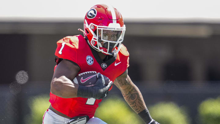 Apr 13, 2024; Athens, GA, USA; Georgia Bulldogs running back Trevor Etienne (1) runs with the ball during the G-Day Game at Sanford Stadium. Mandatory Credit: Dale Zanine-USA TODAY Sports