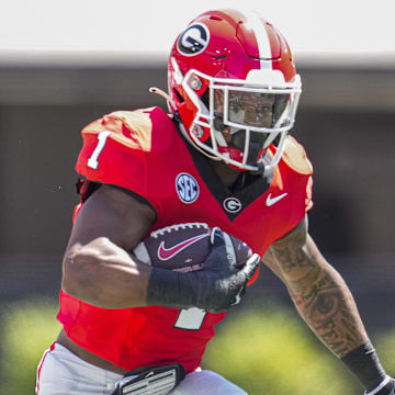 Apr 13, 2024; Athens, GA, USA; Georgia Bulldogs running back Trevor Etienne (1) runs with the ball during the G-Day Game at Sanford Stadium. Mandatory Credit: Dale Zanine-Imagn Images