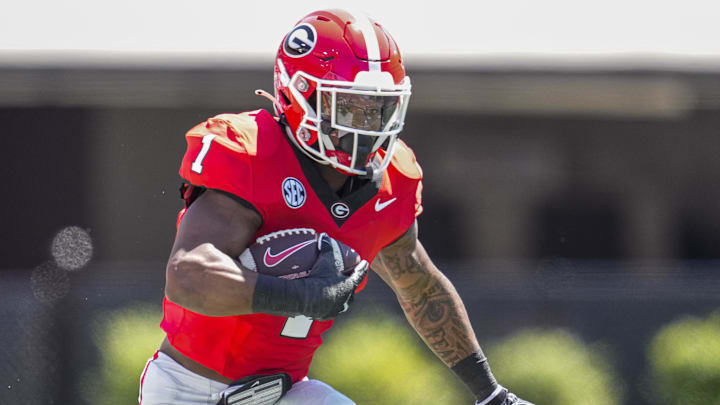 Apr 13, 2024; Athens, GA, USA; Georgia Bulldogs running back Trevor Etienne (1) runs with the ball during the G-Day Game at Sanford Stadium. Mandatory Credit: Dale Zanine-Imagn Images