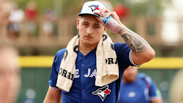 Mar 21, 2024; Bradenton, Florida, USA; Toronto Blue Jays pitcher Ricky Tiedemann (70) walks to the dugout before the game against the Pittsburgh Pirates at LECOM Park. Mandatory Credit: Kim Klement Neitzel-Imagn Images