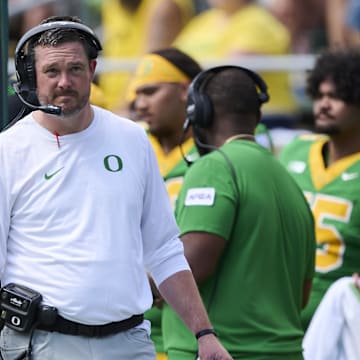 Aug 30, 2025; Eugene, Oregon, USA; Oregon Ducks head coach Dan Lanning walks the sidelines during the first half in a game against the Montana State Bobcats at Autzen Stadium. Mandatory Credit: Troy Wayrynen-Imagn Images