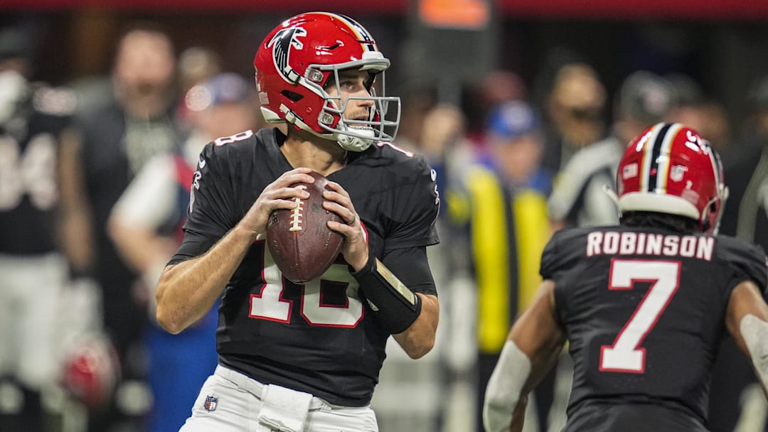 Dec 29, 2025; Atlanta, Georgia, USA; Atlanta Falcons quarterback Kirk Cousins (18) looks downfield against the Los Angeles Rams during the first quarter at Mercedes-Benz Stadium. Mandatory Credit: Dale Zanine-Imagn Images