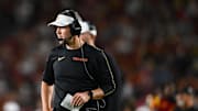 Sep 7, 2024; Los Angeles, California, USA; USC Trojans head coach Lincoln Riley reacts against the Utah State Aggies during the second quarter at United Airlines Field at Los Angeles Memorial Coliseum. Mandatory Credit: Jonathan Hui-Imagn Images