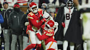 Jan 18, 2025; Kansas City, Missouri, USA; Kansas City Chiefs cornerback Jaylen Watson (35) and safety Justin Reid (20) break up a pass intended for Houston Texans wide receiver Nico Collins (12) during the fourth quarter of a 2025 AFC divisional round game at GEHA Field at Arrowhead Stadium. Mandatory Credit: Jay Biggerstaff-Imagn Images