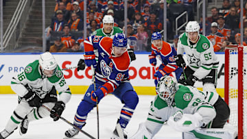Dallas Stars goaltender Jake Oettinger (29) makes a save on Edmonton Oilers forward Ryan Nugent-Hopkins (93)
