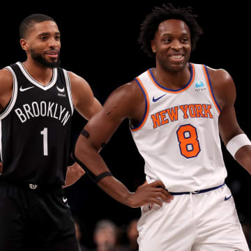 Jan 23, 2024; Brooklyn, New York, USA; Brooklyn Nets forward Mikal Bridges (1) talks to New York Knicks forward OG Anunoby (8) during the first quarter at Barclays Center. Mandatory Credit: Brad Penner-USA TODAY Sports