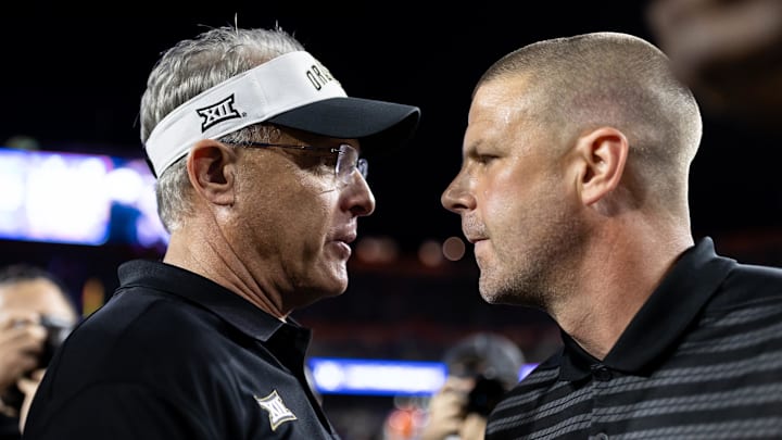 Oct 5, 2024; Gainesville, Florida, USA; UCF Knights head coach Gus Malzahn and Florida Gators head coach Billy Napier talk after the game at Ben Hill Griffin Stadium. Mandatory Credit: Matt Pendleton-Imagn Images