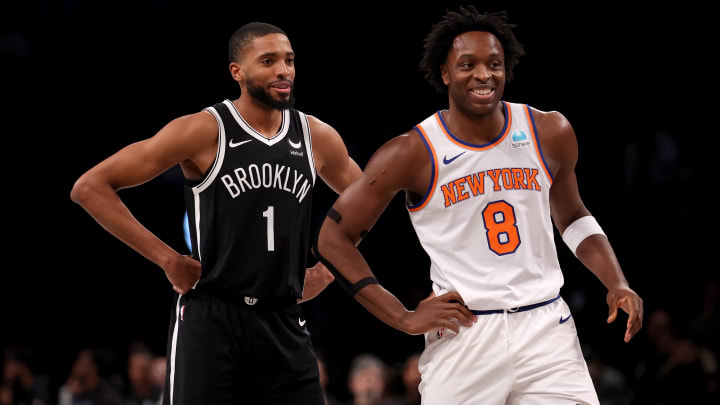 Jan 23, 2024; Brooklyn, New York, USA; Brooklyn Nets forward Mikal Bridges (1) talks to New York Knicks forward OG Anunoby (8) during the first quarter at Barclays Center. Mandatory Credit: Brad Penner-USA TODAY Sports