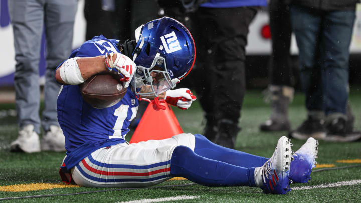Jan 7, 2024; East Rutherford, New Jersey, USA; New York Giants wide receiver Wan'Dale Robinson (17) reacts after a reception during the first half against the Philadelphia Eagles at MetLife Stadium.  