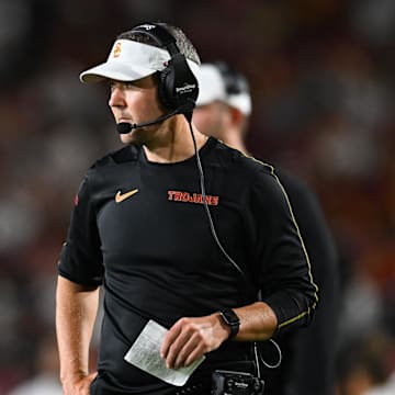 Sep 7, 2024; Los Angeles, California, USA; USC Trojans head coach Lincoln Riley reacts against the Utah State Aggies during the second quarter at United Airlines Field at Los Angeles Memorial Coliseum. Mandatory Credit: Jonathan Hui-Imagn Images
