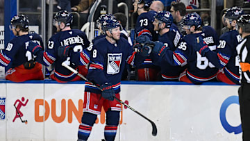 Apr 9, 2025; New York, New York, USA;  New York Rangers left wing J.T. Miller (8) celebrates his goal against the Philadelphia Flyers during the third period at Madison Square Garden. Mandatory Credit: Dennis Schneidler-Imagn Images