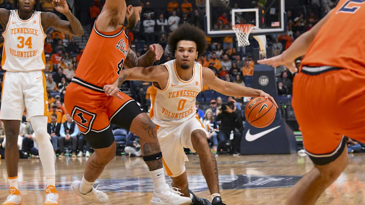 Dec 6, 2025; Nashville, Tennessee, USA;  Tennessee Volunteers guard Ja'Kobi Gillespie (0) drives to the basket against the Illinois Fighting Illini during the first half at Bridgestone Arena. Mandatory Credit: Steve Roberts-Imagn Images