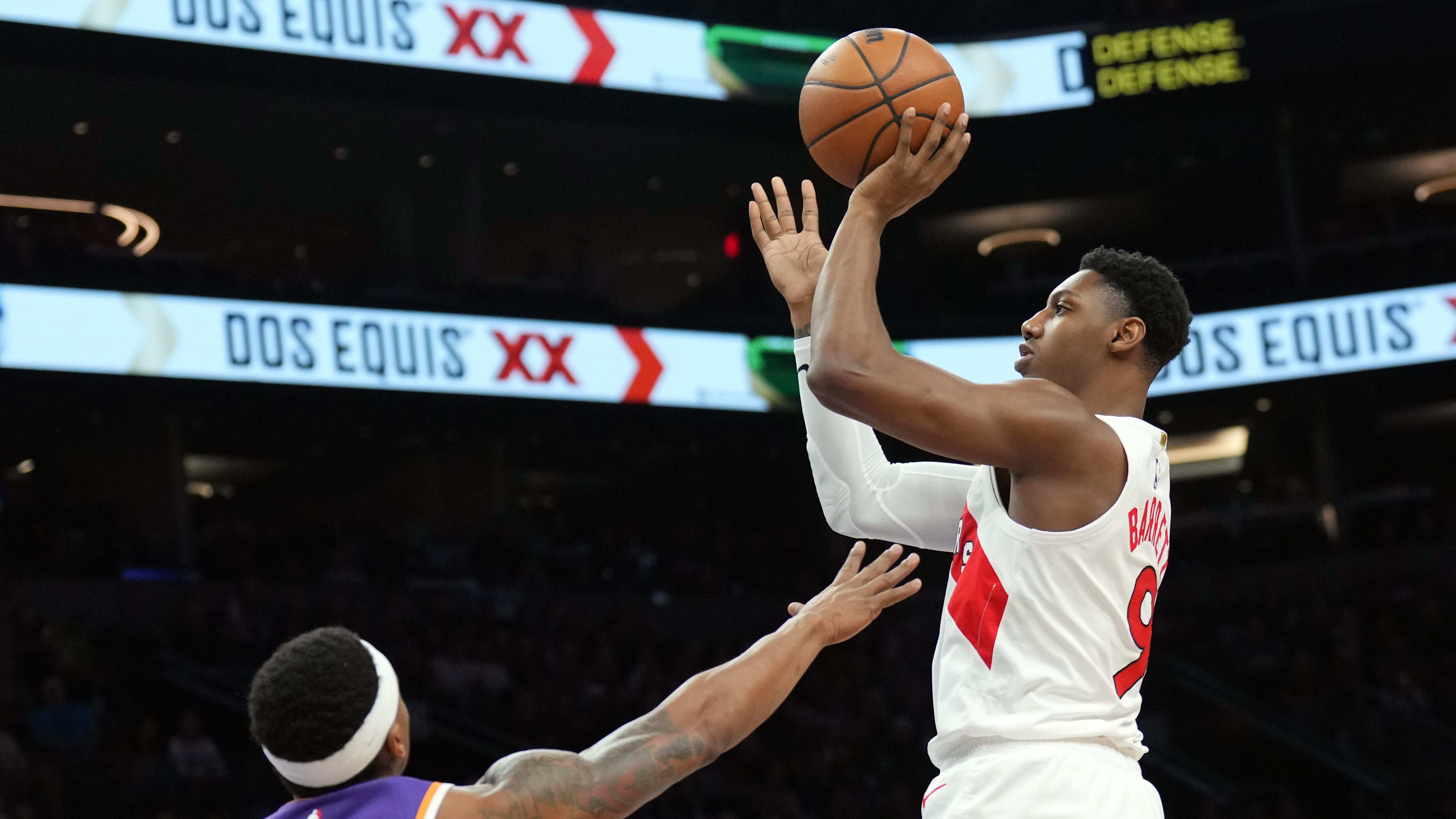 Mar 7, 2024; Phoenix, Arizona, USA; Toronto Raptors guard RJ Barrett (9) shoots over Phoenix Suns