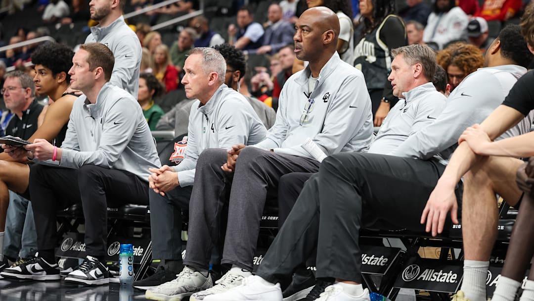 Mar 12, 2025; Kansas City, MO, USA; Colorado Buffaloes assistant coach Danny Manning watches game play during the first half against the West Virginia Mountaineers at T-Mobile Center. Mandatory Credit: William Purnell-Imagn Images