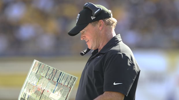 Las Vegas Raiders head coach Jon Gruden looks at his play chart against the Pittsburgh Steelers during the fourth quarter