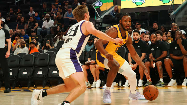 Jul 6, 2024; San Francisco, CA, USA; Los Angeles Lakers guard Bronny James Jr. (9) controls the ball against Sacramento Kings guard Dane Goodwin (33) during the third quarter at Chase Center. Mandatory Credit: Kelley L Cox-USA TODAY Sports Jul 6, 2024; San Francisco, CA, USA; Los Angeles Lakers guard Bronny James Jr. (9) controls the ball against Sacramento Kings guard Dane Goodwin (33) during the third quarter at Chase Center. Mandatory Credit: Kelley L Cox-USA TODAY Sports