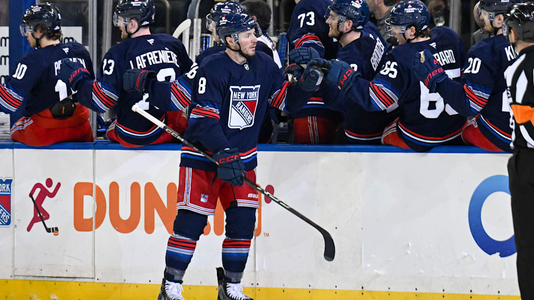 Apr 9, 2025; New York, New York, USA;  New York Rangers left wing J.T. Miller (8) celebrates his goal against the Philadelphia Flyers during the third period at Madison Square Garden. Mandatory Credit: Dennis Schneidler-Imagn Images